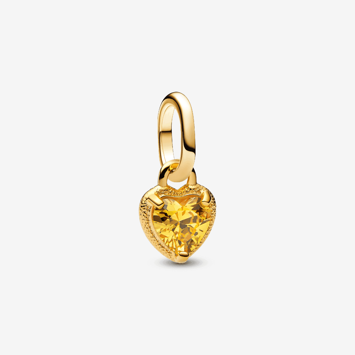 Charm Mini Colgante Corazón Pandora con circonita cúbica amarilla y chapado en oro vista frontal - 763862C01