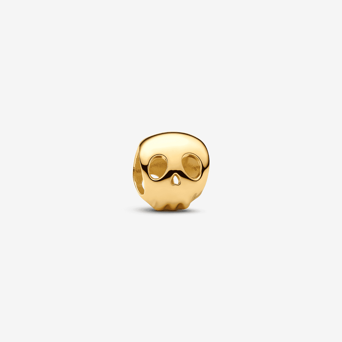 Vista frontal del Charm Pandora Mini Calavera chapado en oro color dorado - 764518C00