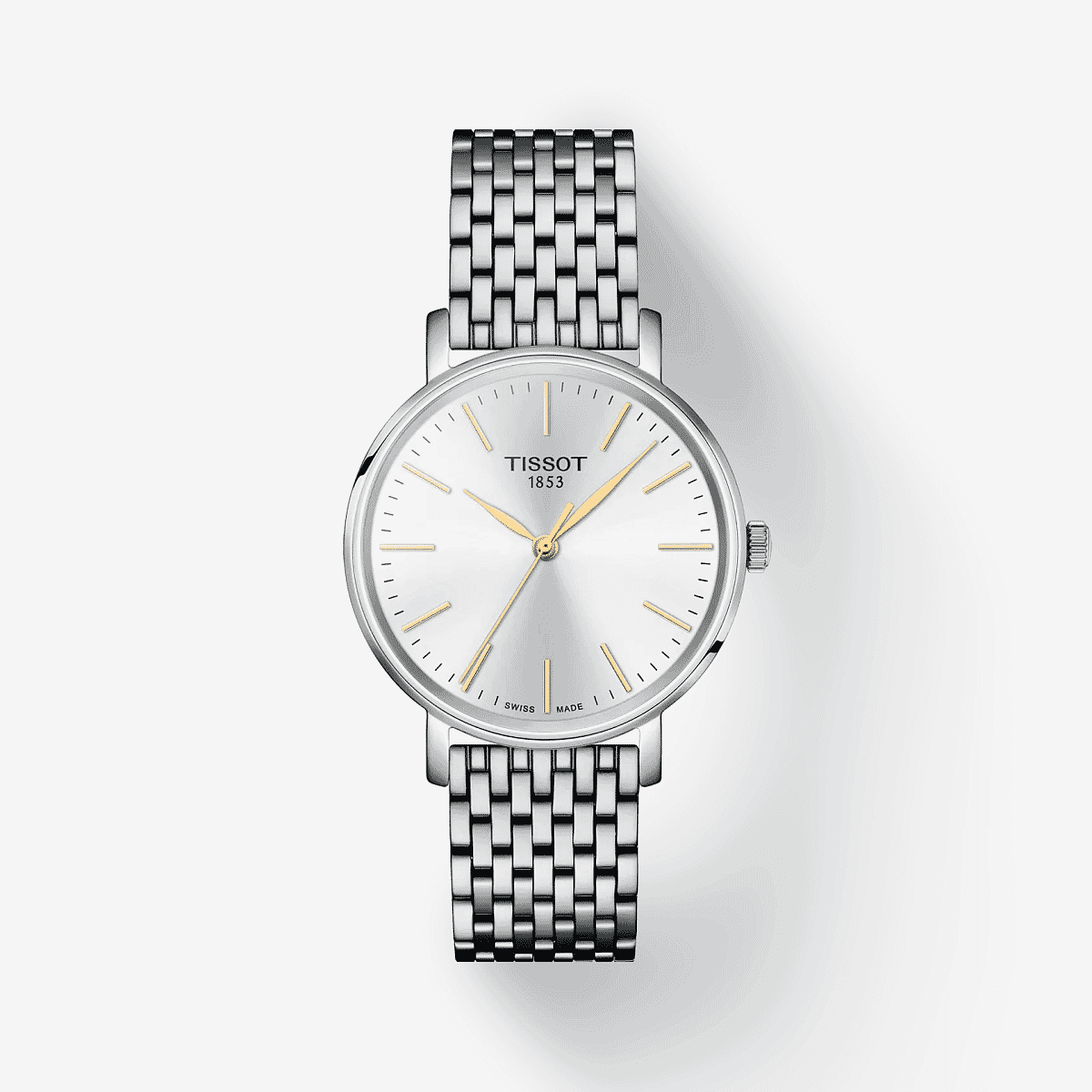 Vista frontal del Reloj Tissot Everytime 34mm con brazalete de acero y esfera blanca - T1432101101101