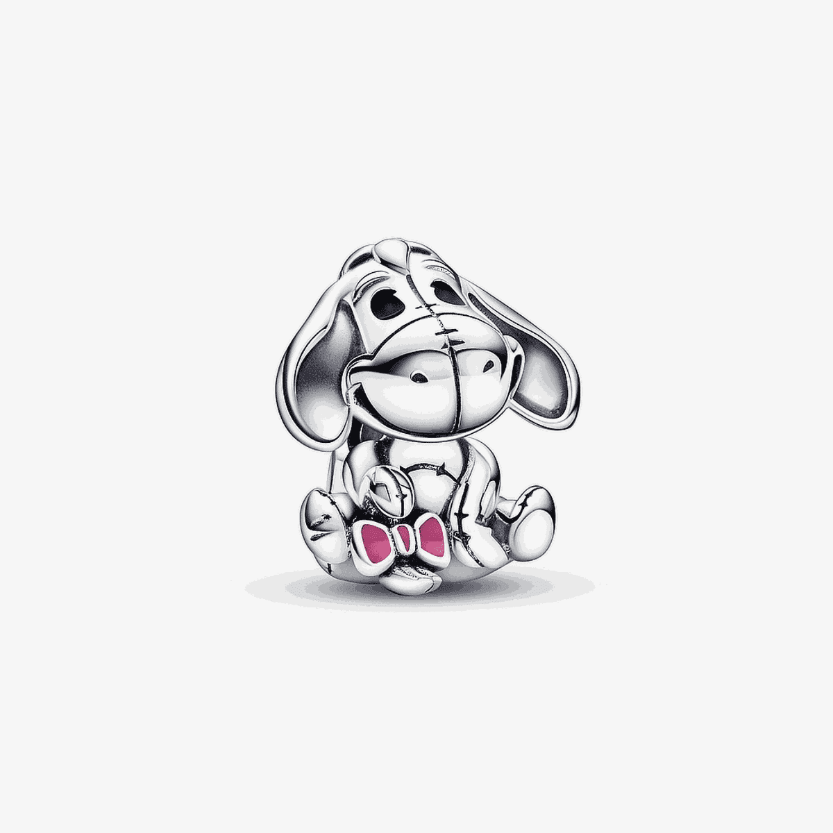 Charm Pandora Igor de plata con lazo rosa de la colección Disney Winnie the Pooh, vista frontal - 792209C01